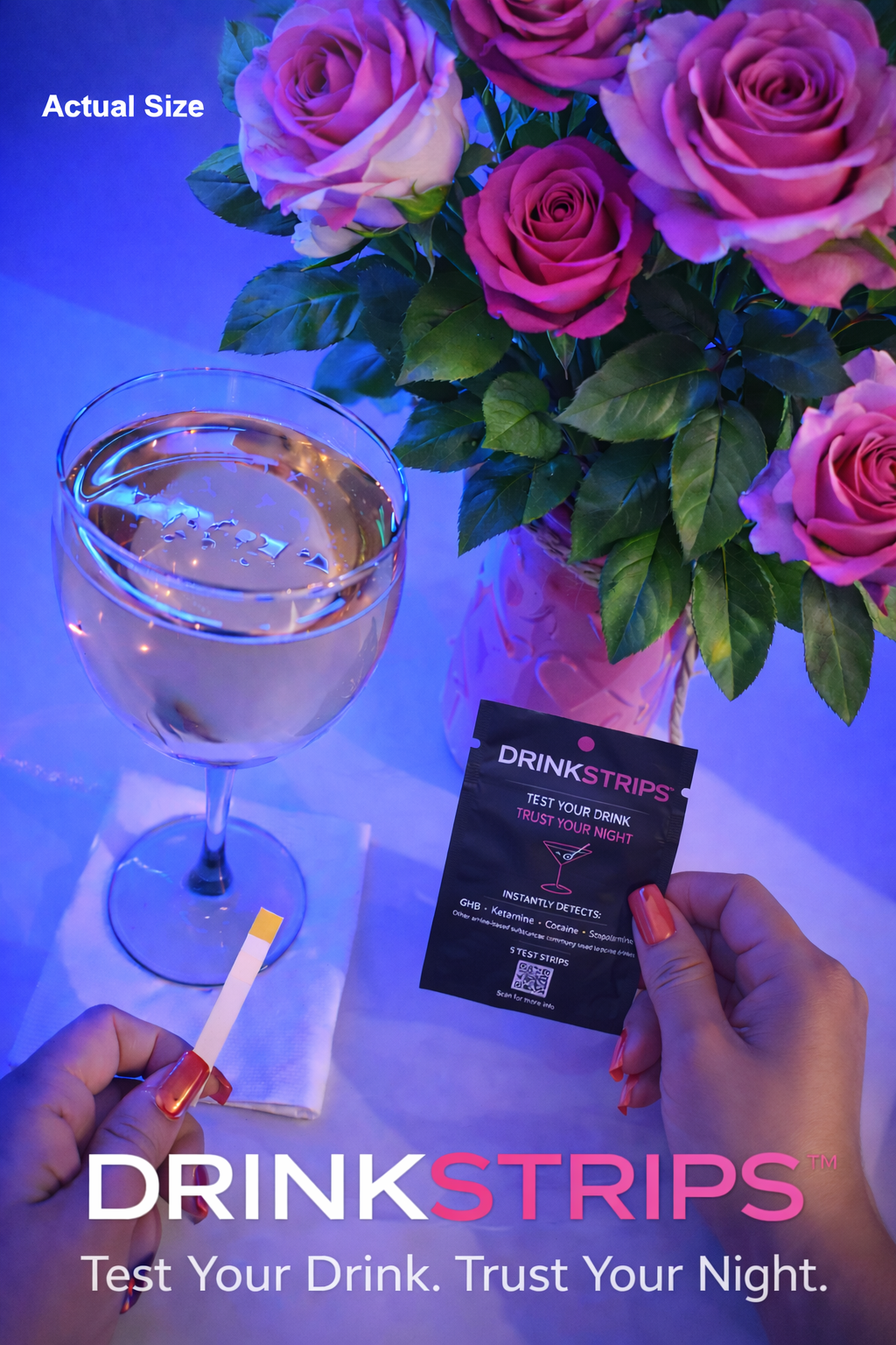 DrinkStrips test strip with a glass of water and pink roses on a blue background